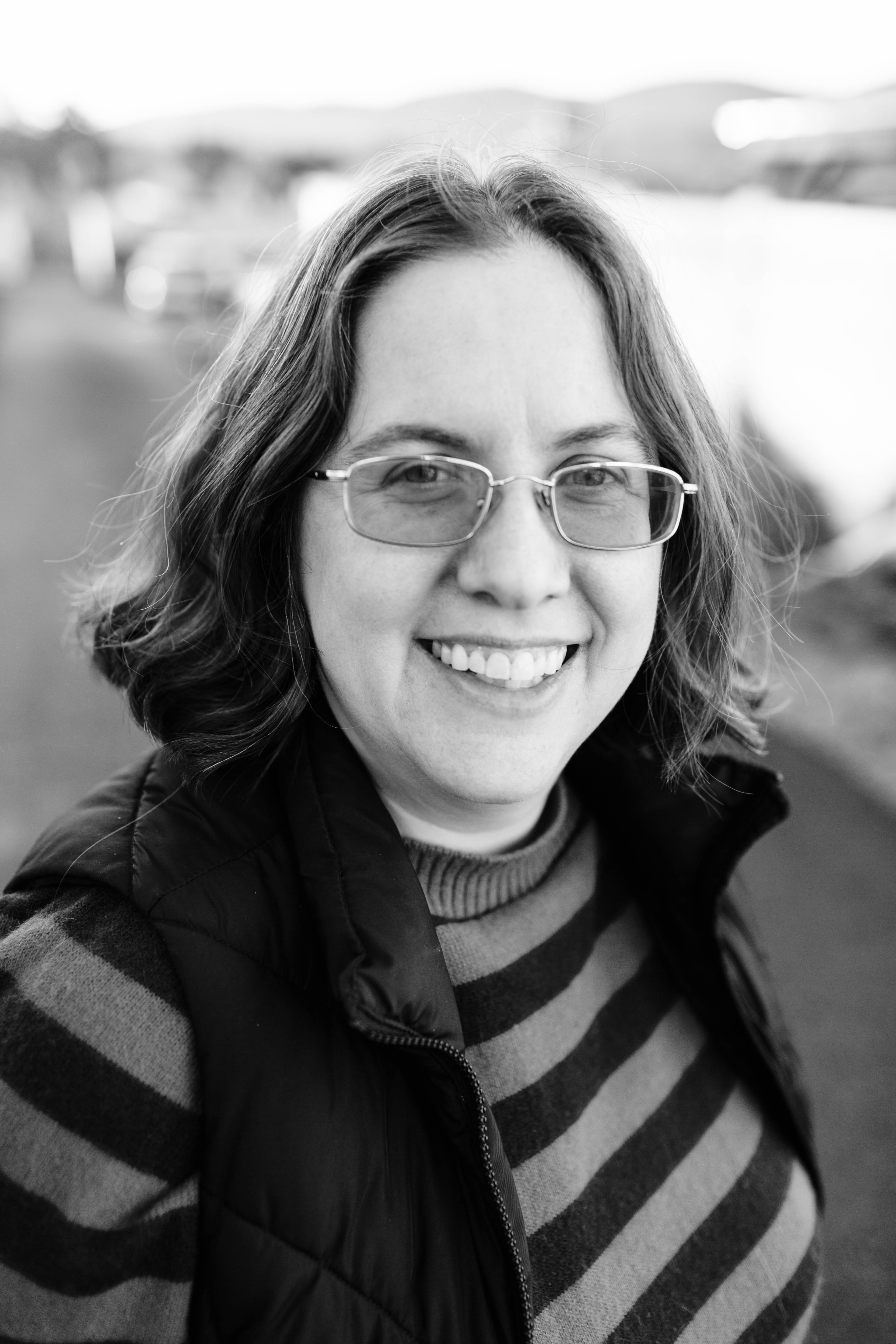 A black and white photograph of the author, Morgan Biscup.